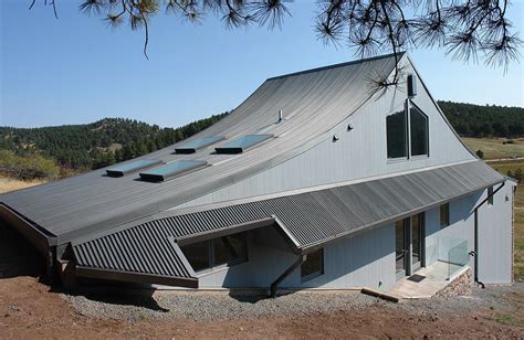 what are those curved corrugated metal roofed houses called|curved metal roofing reviews.